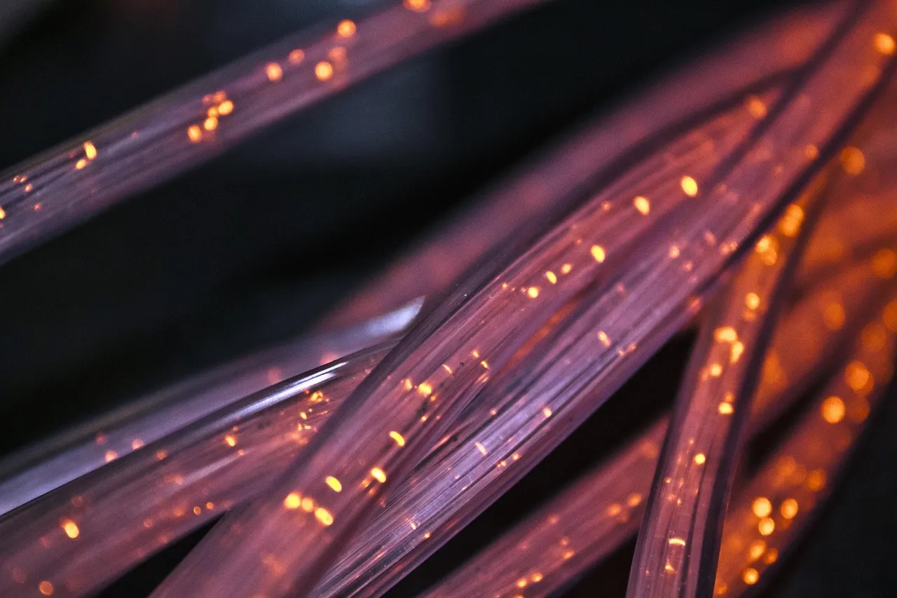 optic fiber cables with light passing through